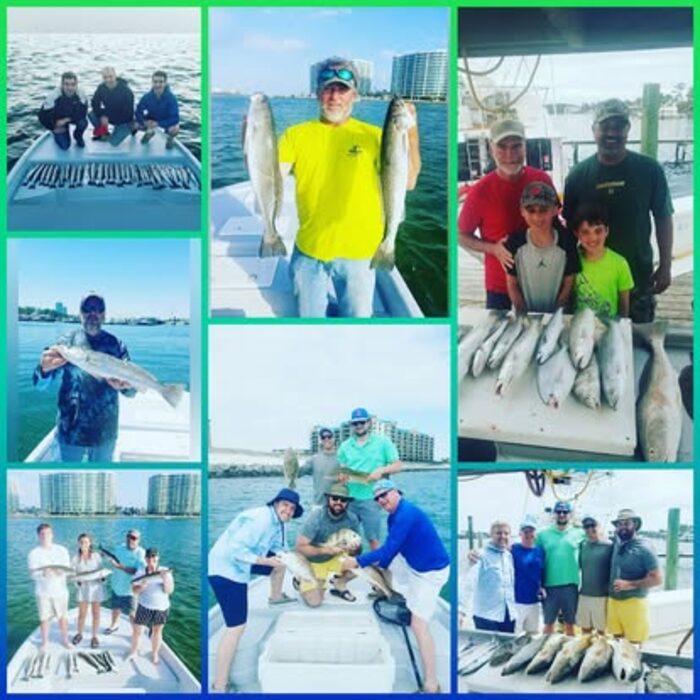 Guests on the docks showing off their catches after Orange Beach charter trips